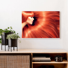 Obraz na płótnie Kobieta z długimi czerwonymi włosami jako tło