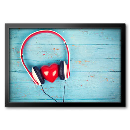 Obraz w ramie Serce wsłuchujące się w muzykę na tle z niebieskiego drewna