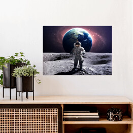 Plakat Astronauta na spacerze kosmicznym na księżycu na tle planety