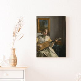 Obraz na płótnie Jan Vermeer "Młoda dziewczyna grająca na gitarze" - reprodukcja