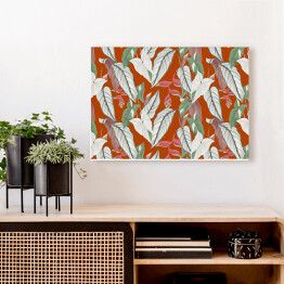 Obraz na płótnie Kolekcja #inspiredspace - rośliny - liście bananowca na tle w kolorze czerwonej cegły