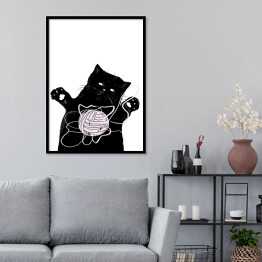 Plakat w ramie Czarny kot z kłębkiem włóczki