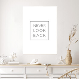 Plakat samoprzylepny Hasło motywacyjne- "Never look back" na białym tle