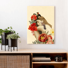 Obraz na płótnie Kobieta z kwiatami i ptakiem na ramieniu