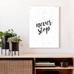 Obraz na płótnie "Never stop" - hasło motywacyjne