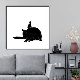 Plakat w ramie Czarny kot myjący ogon