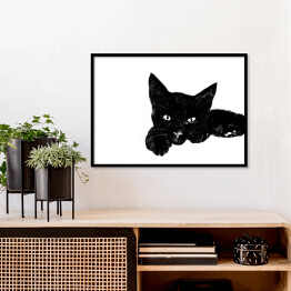 Plakat w ramie Leżący czarny kociak z wyciągniętą łapką